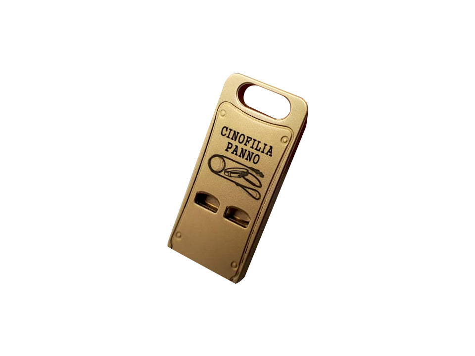 Flat brass whistle with matching whistle holder