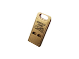 Flat brass whistle with matching whistle holder